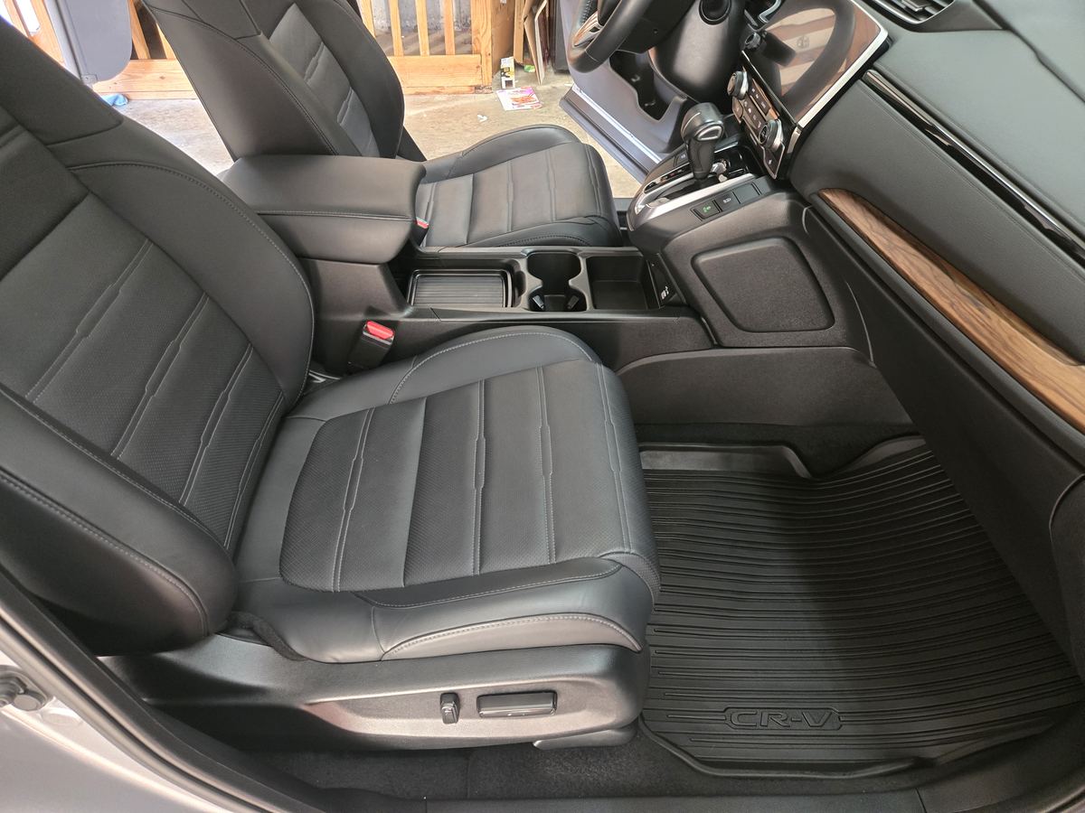 Front seats and floor of a Honda CR-V after an interior detail