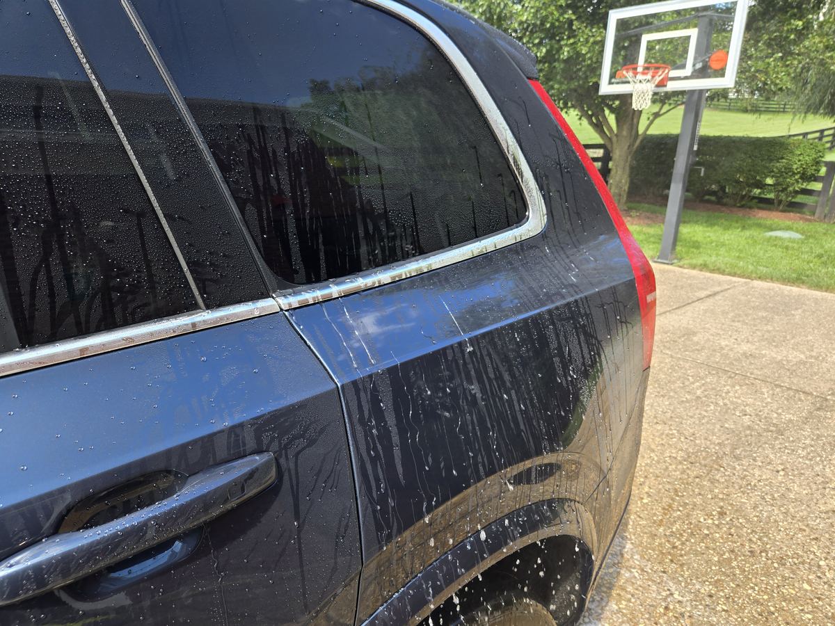Water beading on sealed dark blue paint